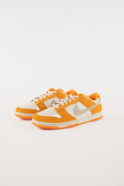 Dunk Low Safari Swoosh Kumquat