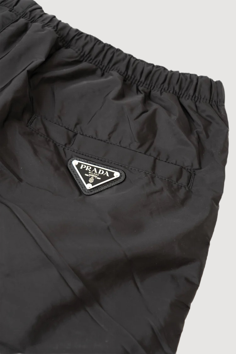 Prada logo-plaque swim shorts