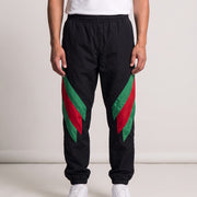 Gucci Tapered Striped Shell Trousers on model, front