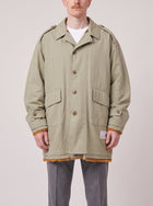 Maison Mihara Yasuhiro Coat Khaki on model, front