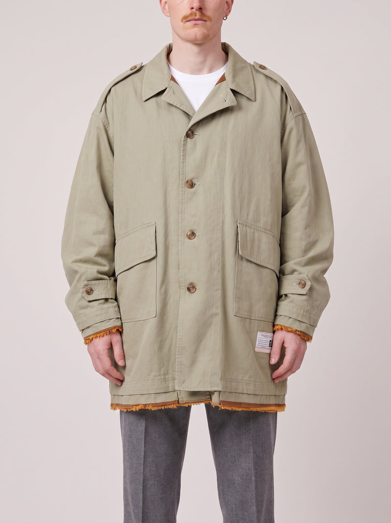 Maison Mihara Yasuhiro Coat Khaki on model, front