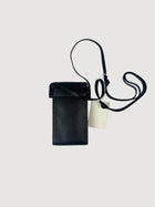 Crossbody phone pouch in leather